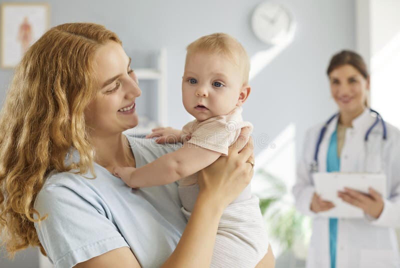 Mother and child with healthcare professional